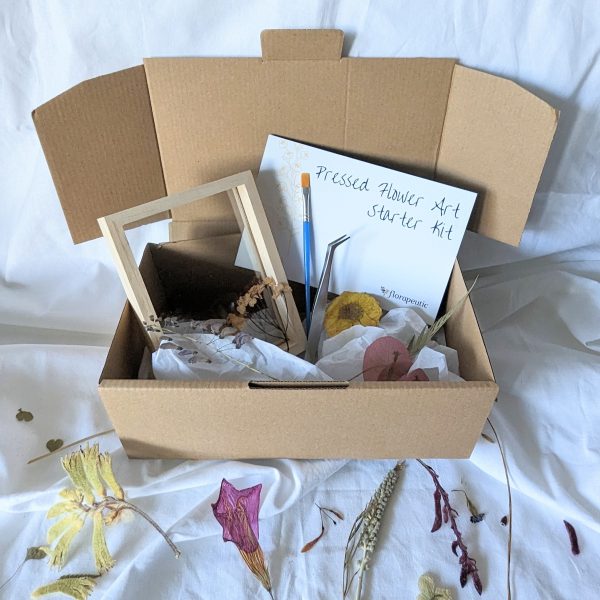 Florapeutic Pressed Flower Art DIY Kit in a box including real pressed flowers, double-sided wooden frame, glue, paintbrush, tweezer and a step-by-step instruction card